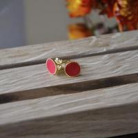 Clou d oreille rouge 